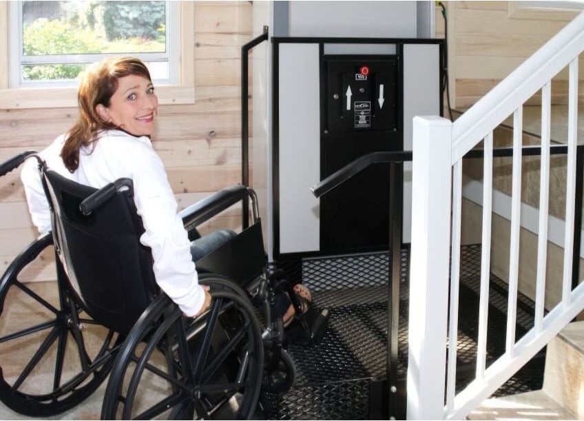 Woman in Wheelchair Lifts in Home - Freedom Lift Systems
